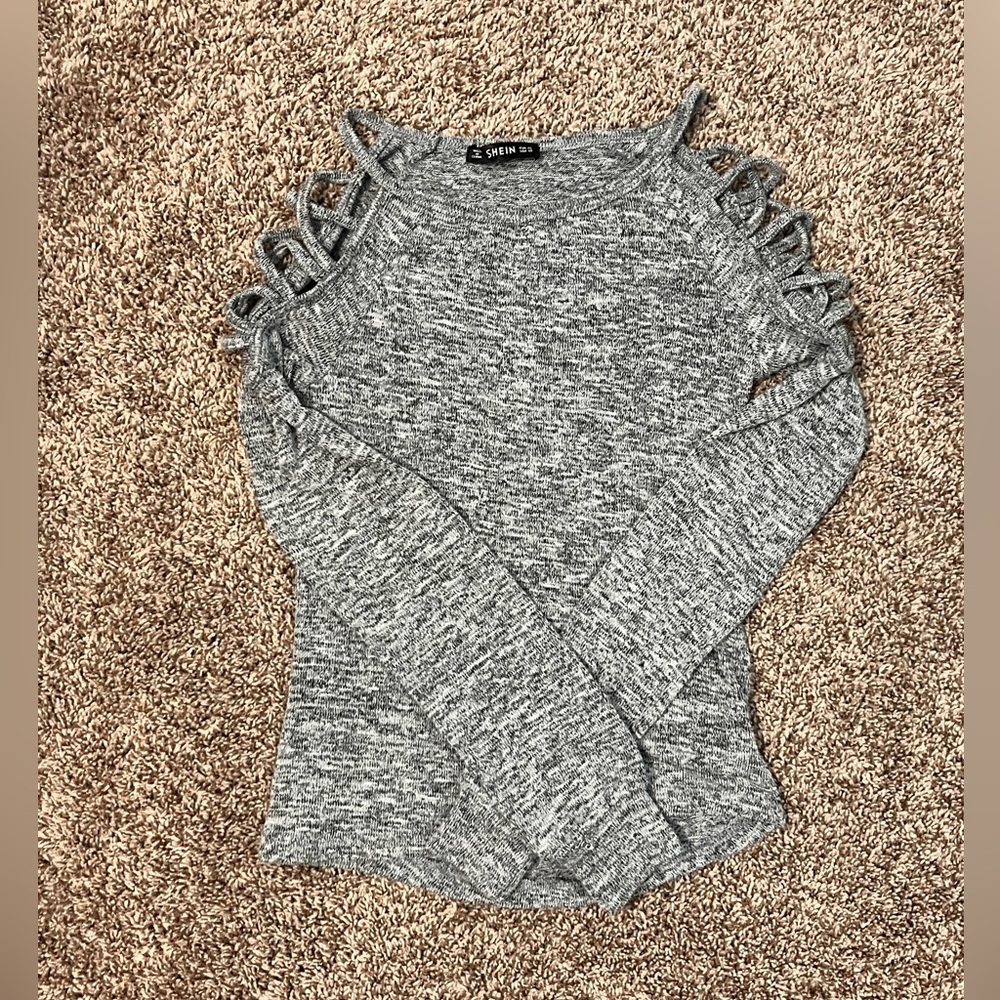 Pretty color with cool design on the sleeves. Great for fall.